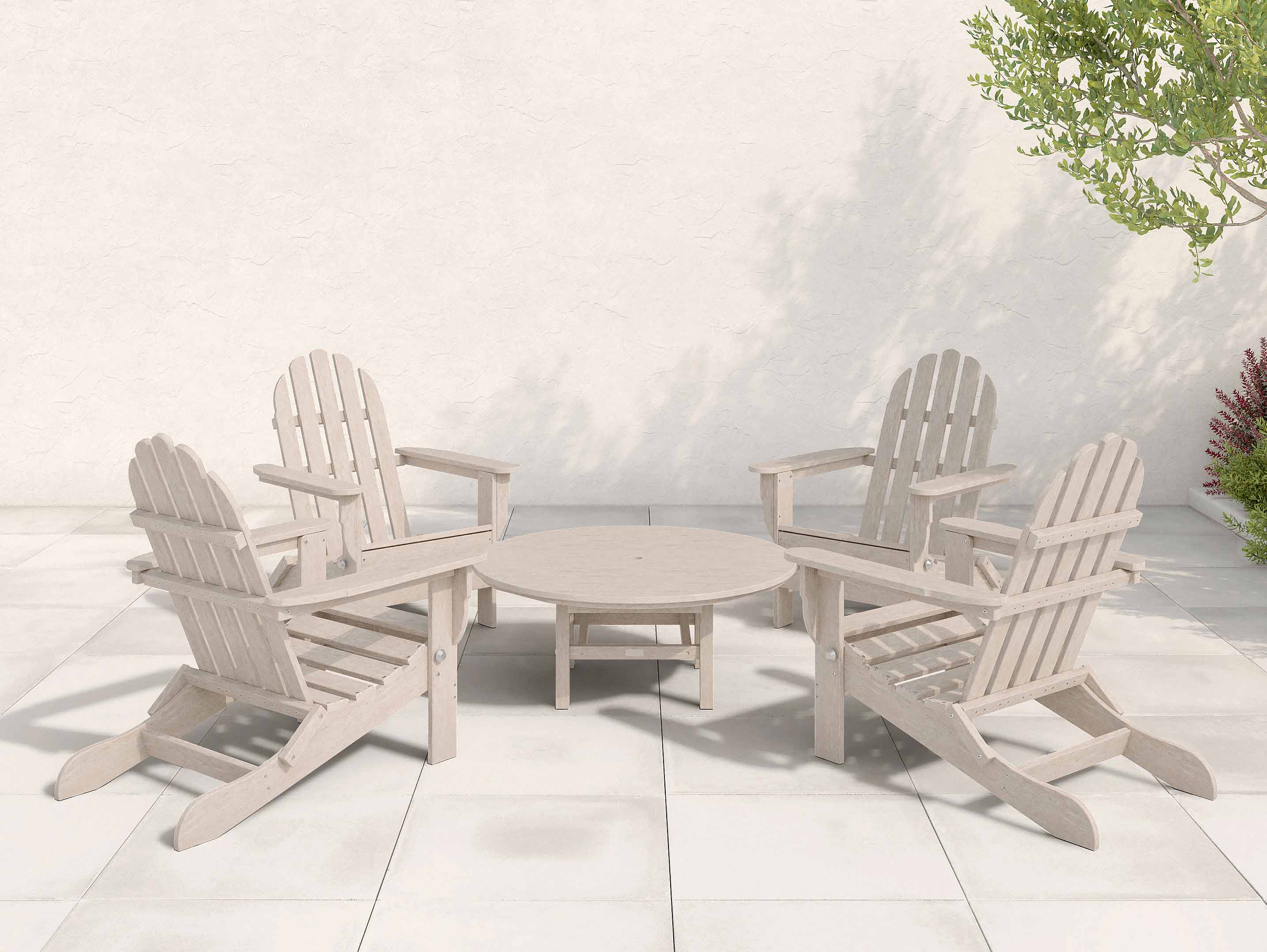 Four Paper Birch Folding Adirondack Chairs surrounding a Madison Conversation Table