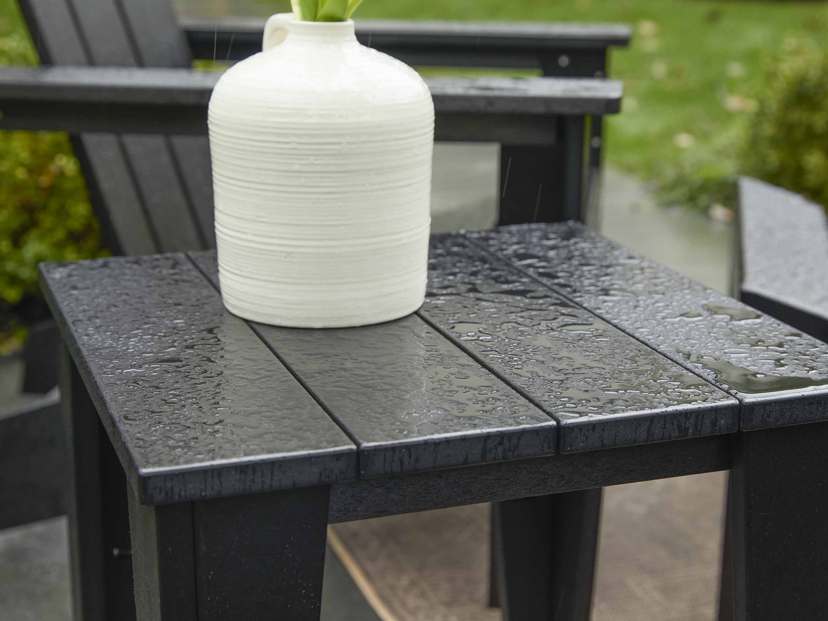 Black Modern Side Table  out in the rain
